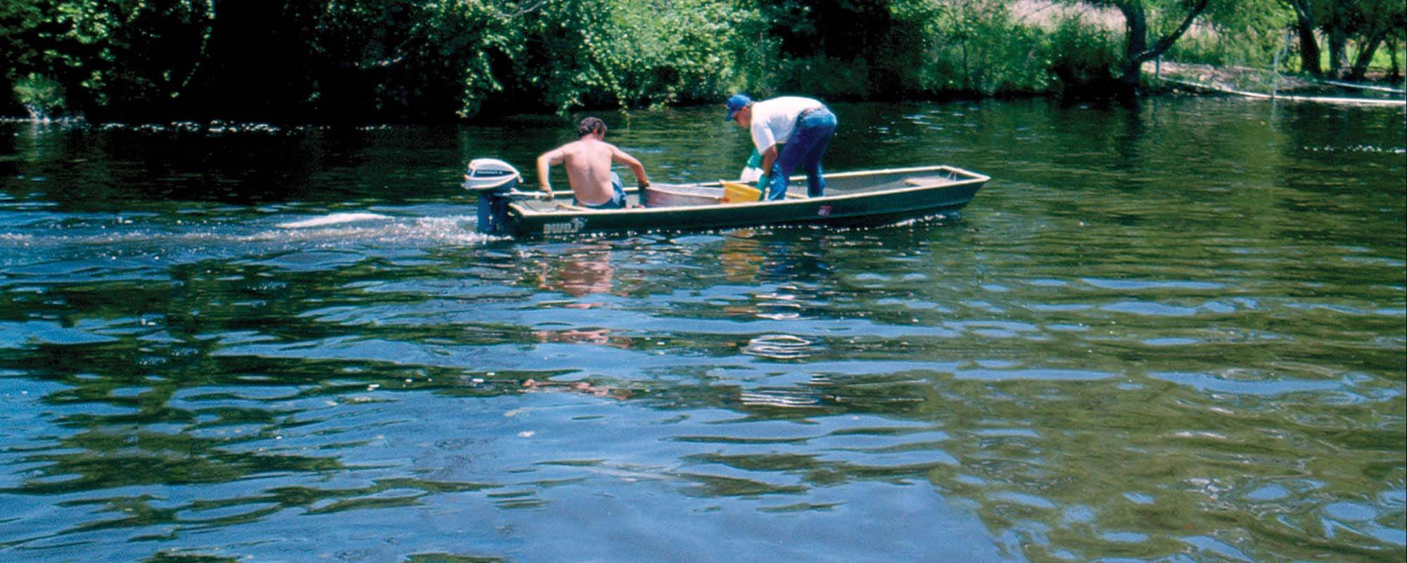 Pond managers in boat
