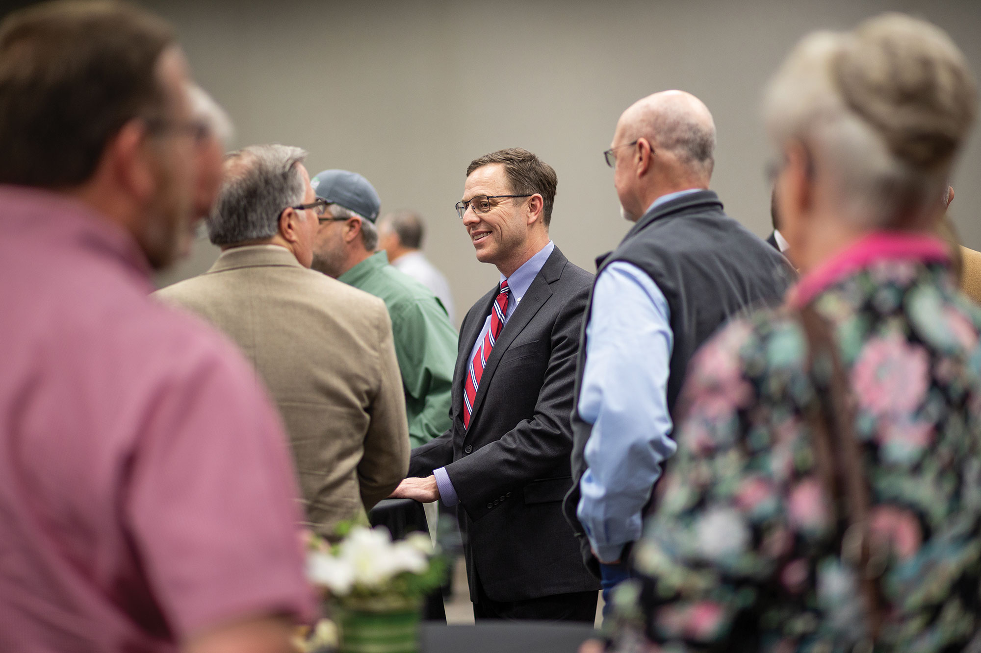 Steve Rhines talks with members of the Ardmore community during a meet-and-greet with the new Noble Research Institute president.