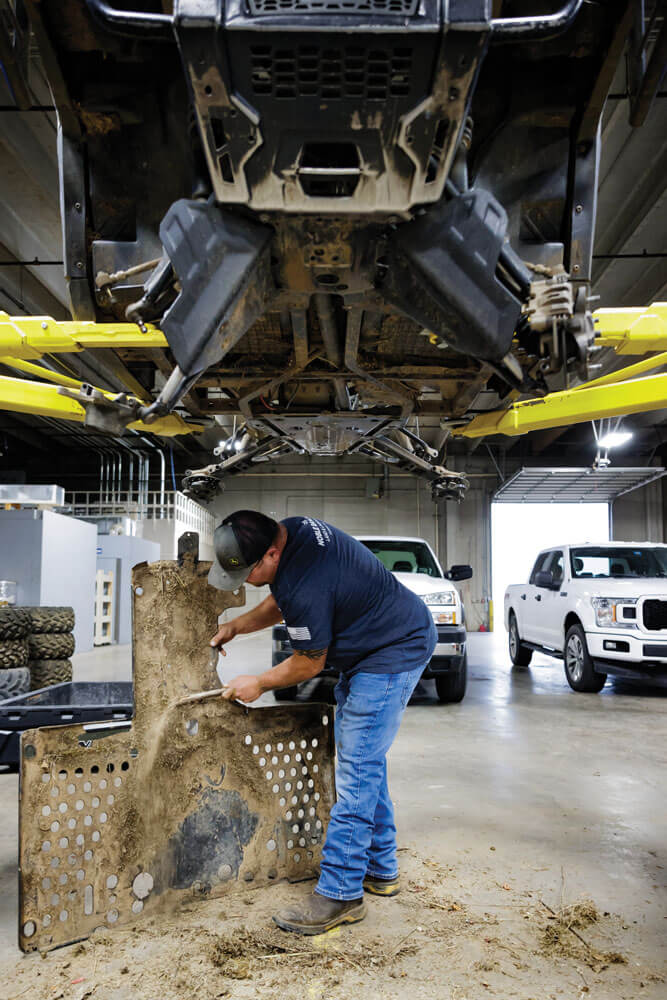 Cleaning skid plate debris