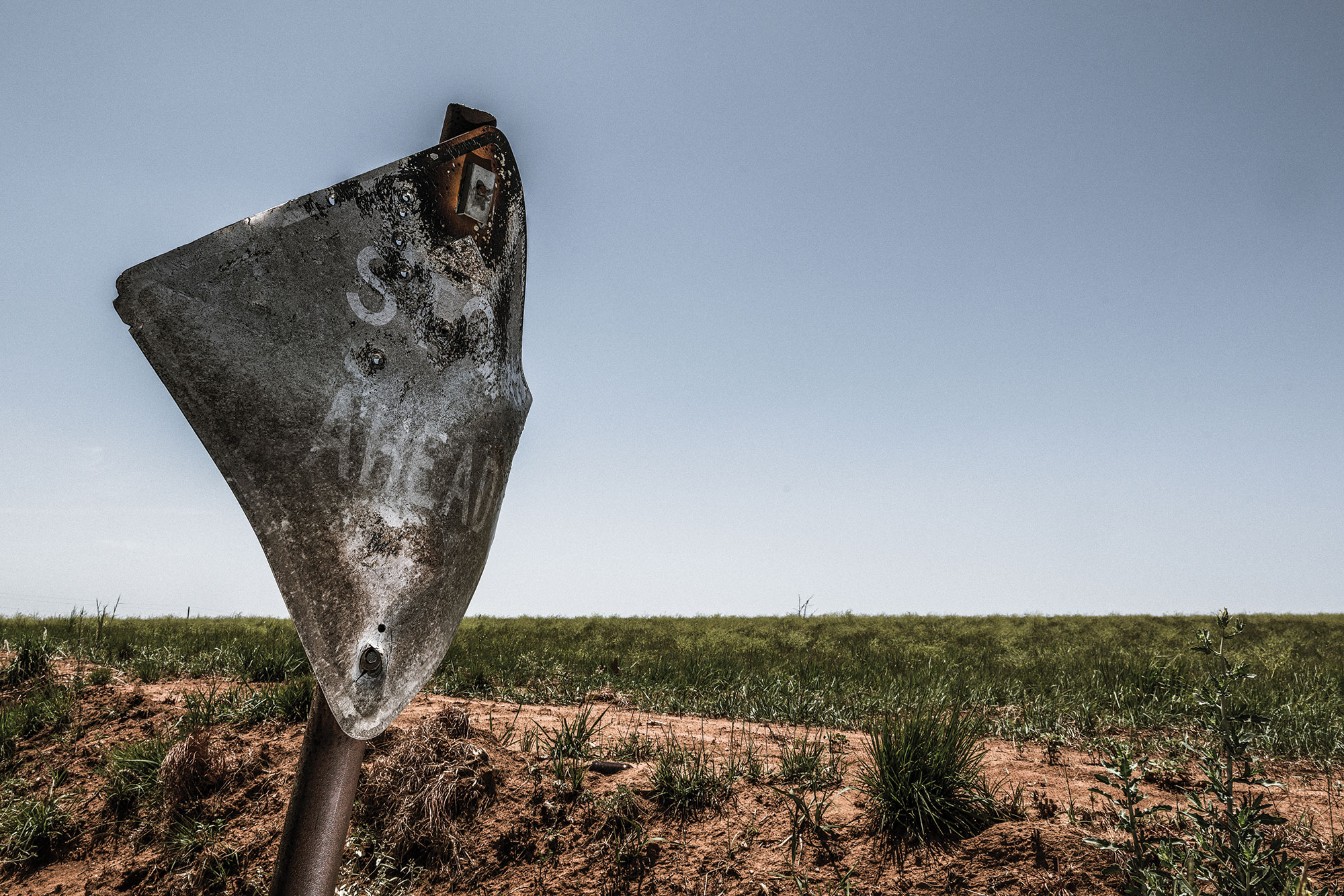 A melted stop sign photographed on July 2, 2018
