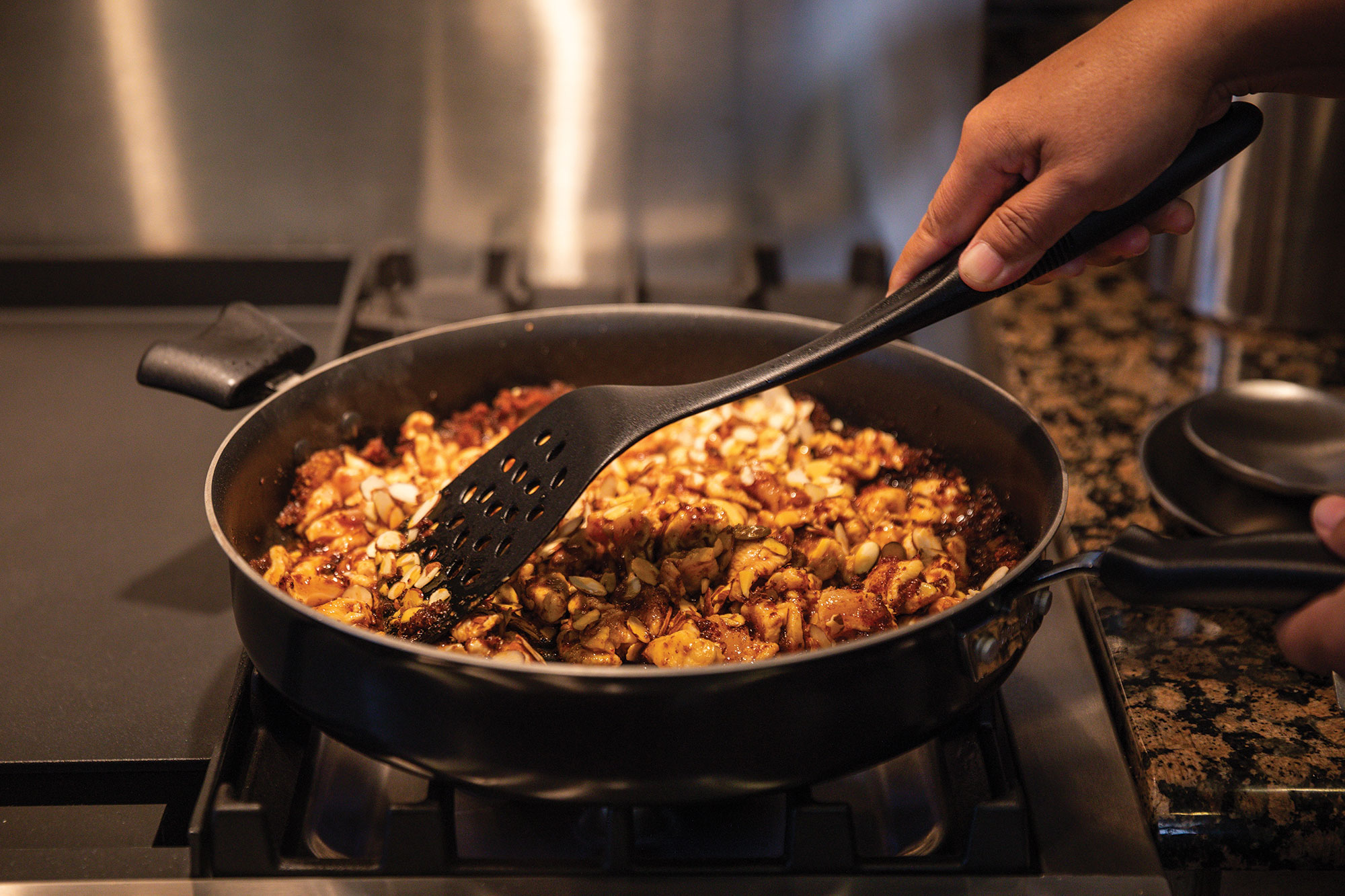 Simmering the Thai Curry Chicken in the Pan Simmering the Thai Curry Chicken in the Pan