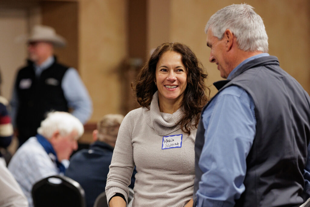 Maria Silveira, Ph.D. talking during a workshop